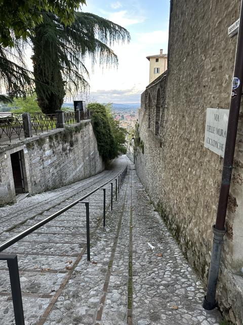 Old stairway between stone walls